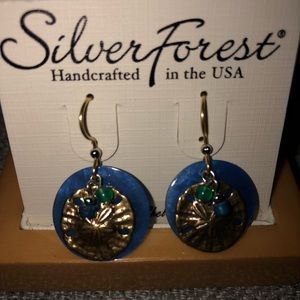 Silver forest genuine shell earrings. Brand new.
